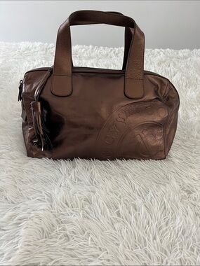Juicy couture, leather handbag.